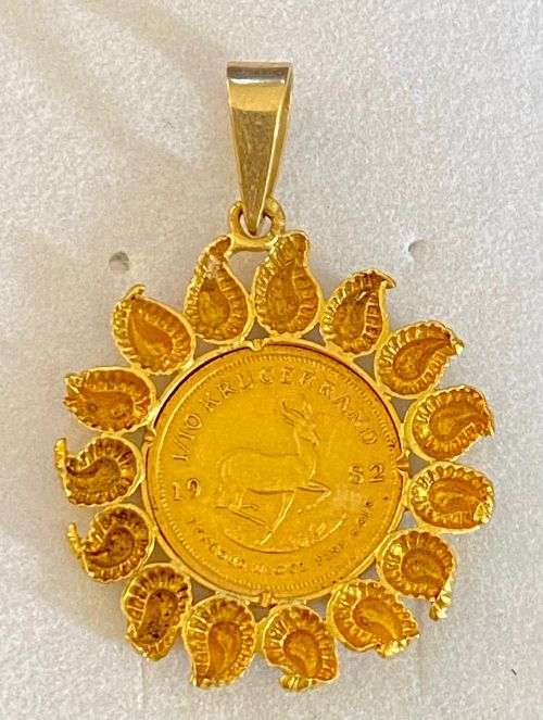1/10 Fine Gold(22ct) Kruger coin 1982 in  22ct surrounding sun pendant