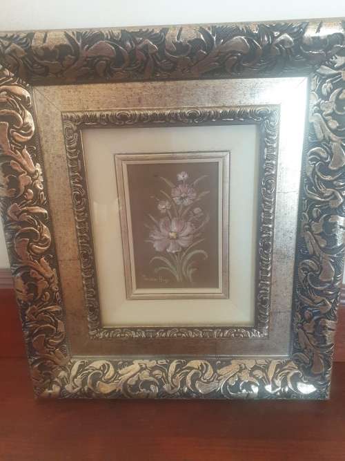 Pastel flower in very ornate frame by Susan Hugo