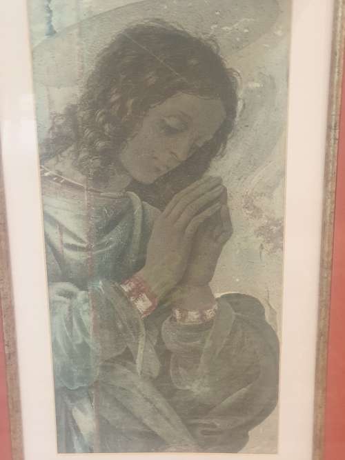 Madonna praying in wooden frame