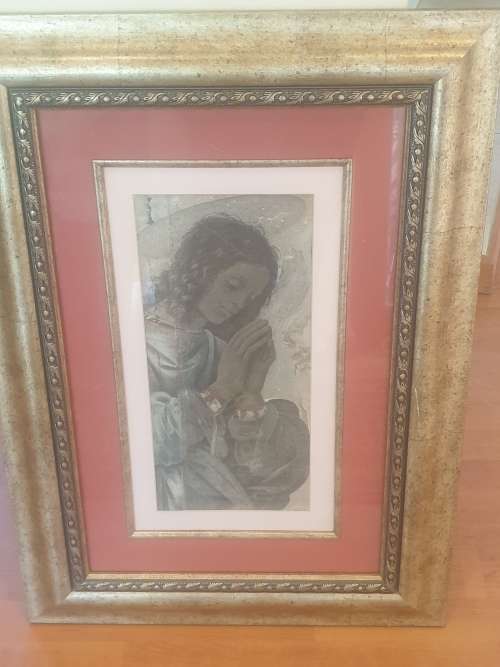 Madonna praying in wooden frame
