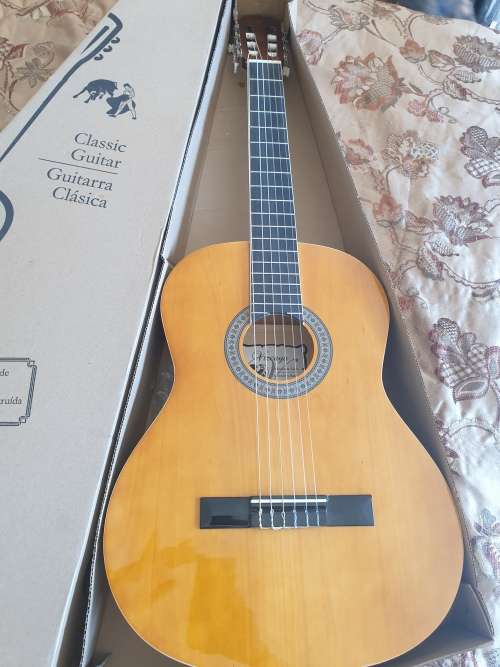 Brand New Vizcaya full size classic guitar -natural wood colour