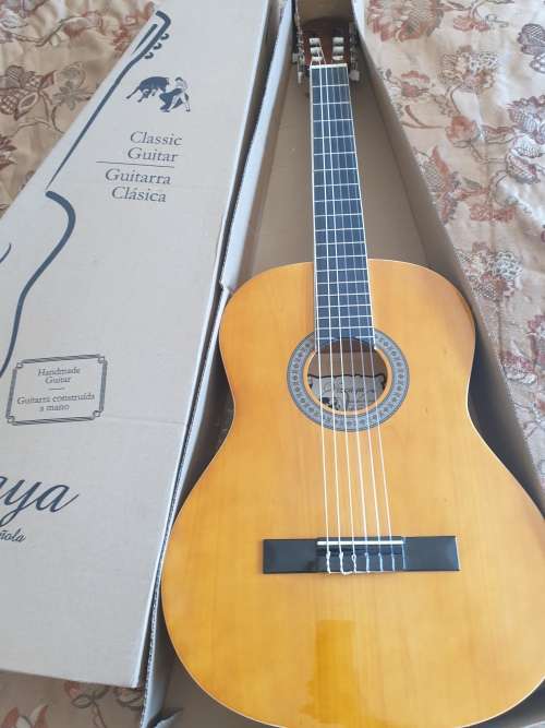 Brand New Vizcaya full size classic guitar -natural wood colour