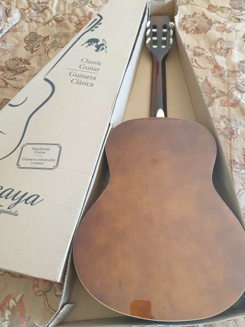 Brand New Vizcaya full size classic guitar -natural wood colour