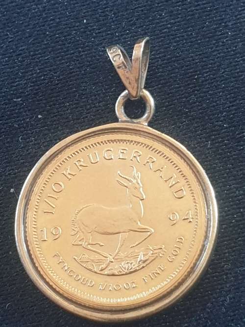 1/10th Kruger rand coin set on a 9ct gold pendant-Year 1994