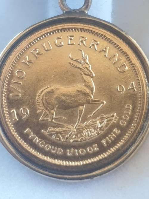1/10th Kruger rand coin set on a 9ct gold pendant-Year 1994