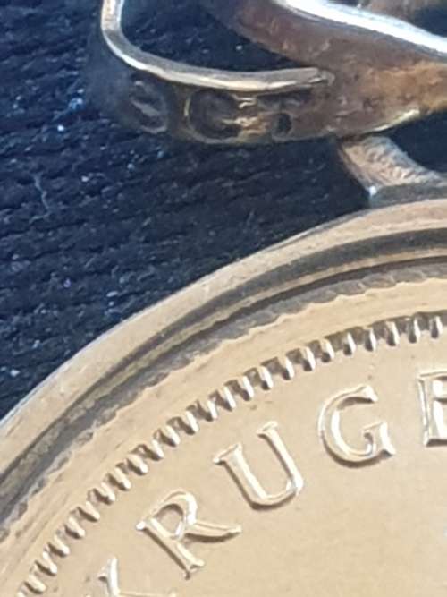 1/10th Kruger rand coin set on a 9ct gold pendant-Year 1994
