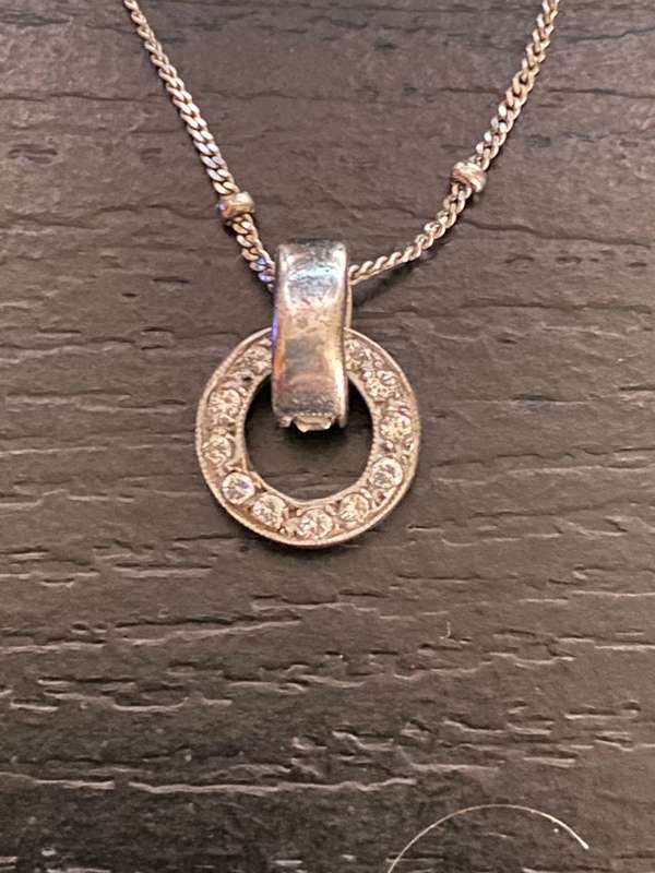9ct white gold chain with a 9ct white gold and diamond Halo pendant
