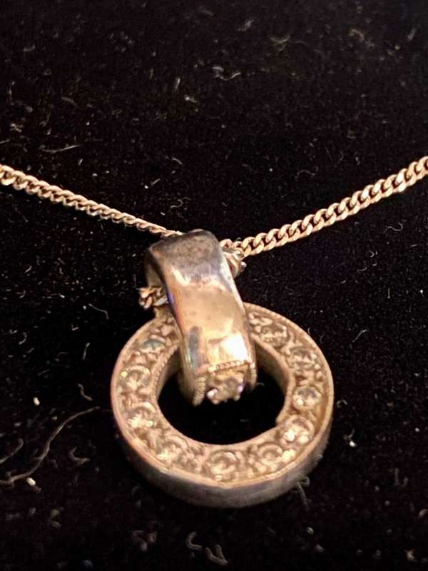 9ct white gold chain with a 9ct white gold and diamond Halo pendant