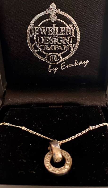 9ct white gold chain with a 9ct white gold and diamond Halo pendant