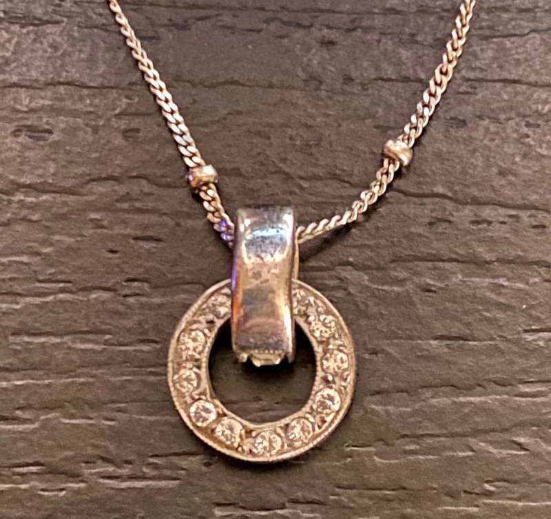 9ct white gold chain with a 9ct white gold and diamond Halo pendant