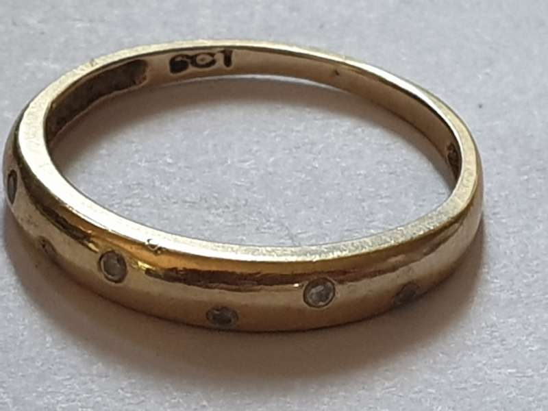 9 ct gold ring with 6 small Cubic Zirconia`s