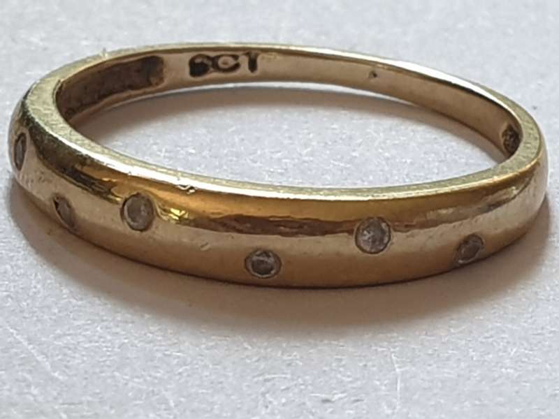 9 ct gold ring with 6 small Cubic Zirconia`s
