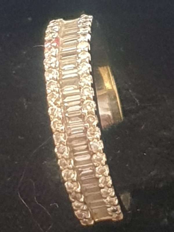 18ct white gold ring with 22 baguette diamond and 42 round cut diamond Eternity Ring