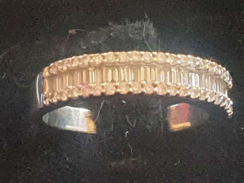 18ct white gold ring with 22 baguette diamond and 42 round cut diamond Eternity Ring