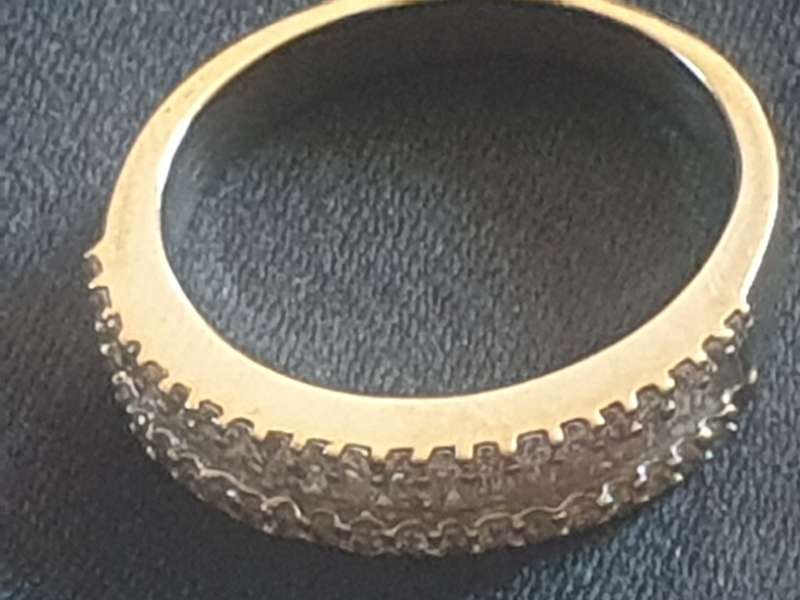 18ct white gold ring with 22 baguette diamond and 42 round cut diamond Eternity Ring
