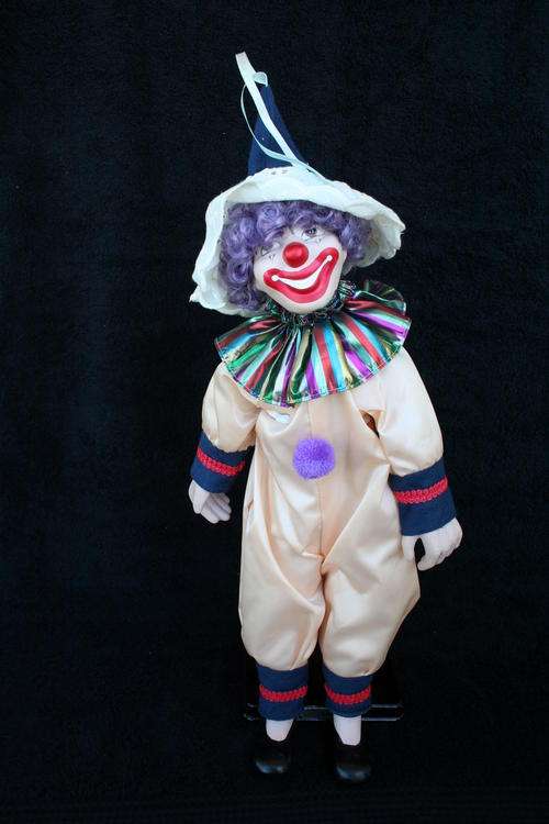 PORCELAIN CLOWN DOLL--FULLY DRESSED WITH STAND