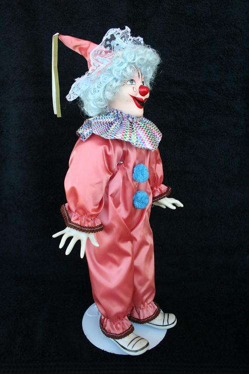 PORCELAIN CLOWN DOLL--FULLY DRESSED WITH STAND