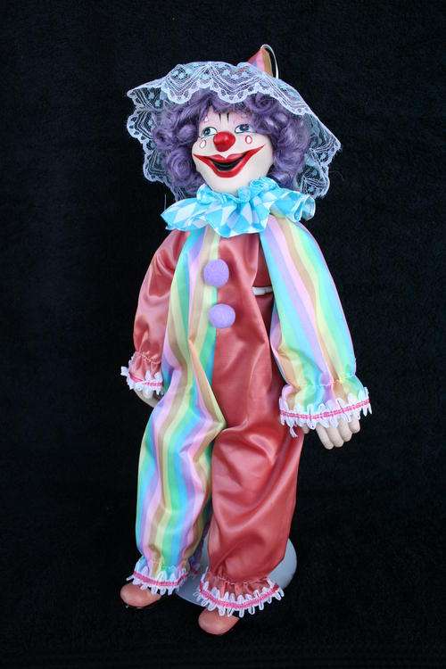 PORCELAIN CLOWN DOLL--FULLY DRESSED WITH STAND