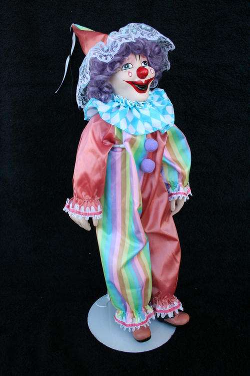 PORCELAIN CLOWN DOLL--FULLY DRESSED WITH STAND