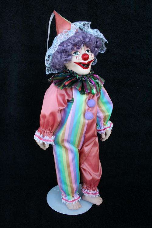 PORCELAIN CLOWN DOLL--FULLY DRESSED WITH STAND