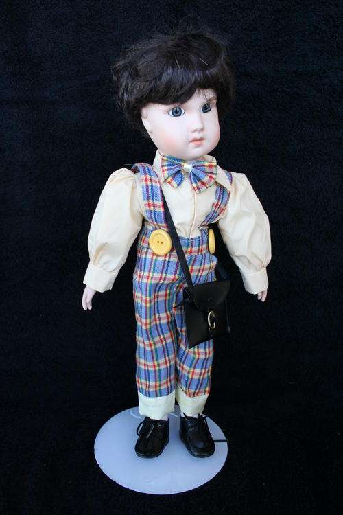 PORCELAIN BOY/GIRL  DOLL--FULLY DRESSED WITH STAND