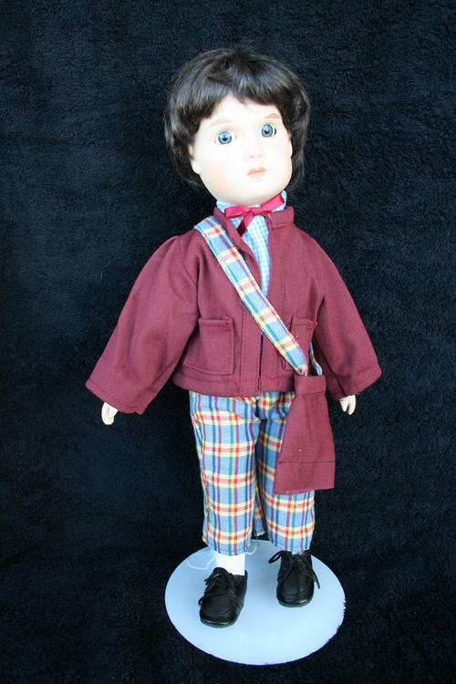 PORCELAIN BOY/GIRL  DOLL--FULLY DRESSED WITH STAND