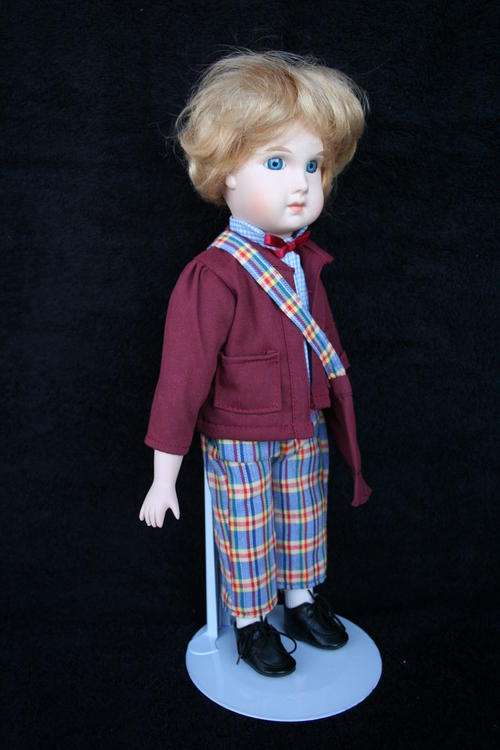 PORCELAIN BOY/GIRL  DOLL--FULLY DRESSED WITH STAND