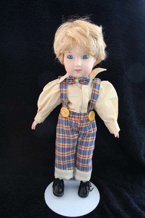 PORCELAIN BOY/GIRL  DOLL--FULLY DRESSED WITH STAND