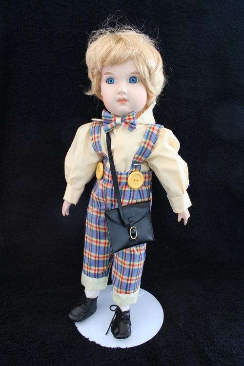 PORCELAIN BOY/GIRL  DOLL--FULLY DRESSED WITH STAND