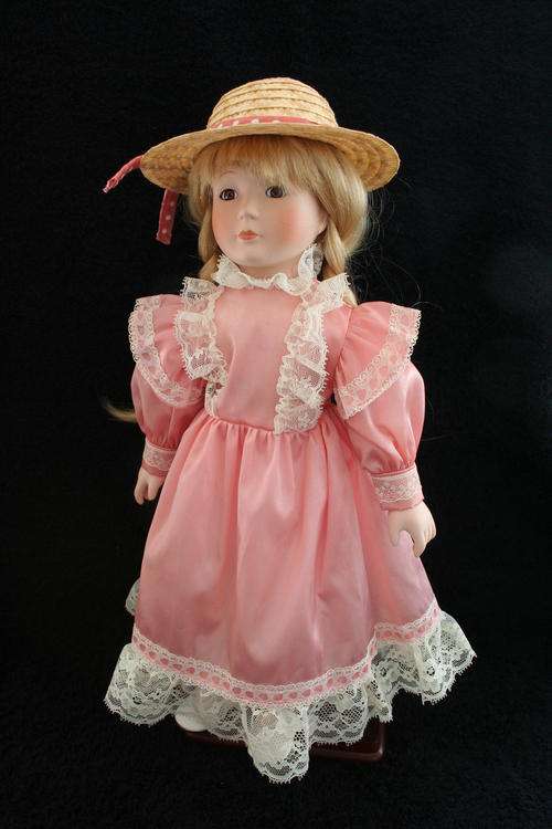 PORCELAIN BOY/GIRL DOLL--FULLY DRESSED WITH STAND