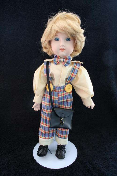 PORCELAIN BOY/GIRL DOLL--FULLY DRESSED WITH STAND
