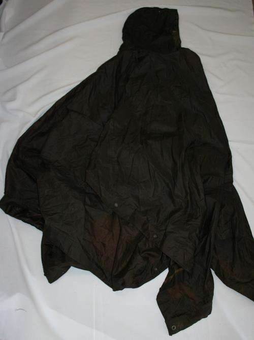 SADF -- DARK PONCHO.