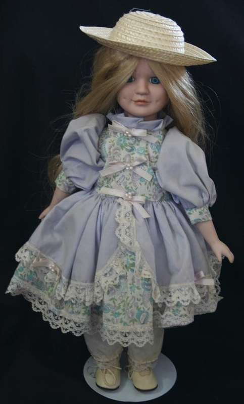 PORCELAIN DOLL WITH HAT ON STAND -- 42cm TALL