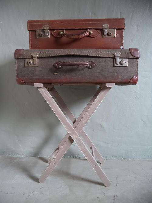 MOST UNUSUAL USAGE OF TWO OLD SUITCASES ON A STAND- ONES OPTIONS ARE ENDLESS