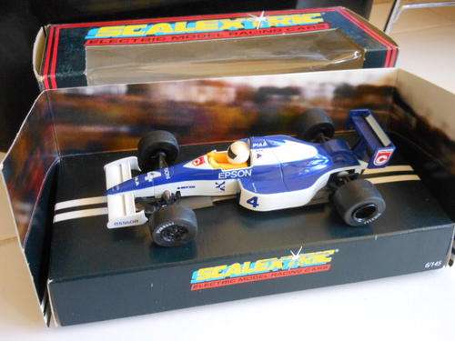 SCALEXTRIC  TYRRELL 018  ---NEW BUT MISSING PINION GEAR