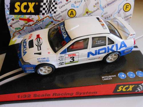 SCX ---MITSUBISHI LANCER --4 WHEEL DRIVE --NEW