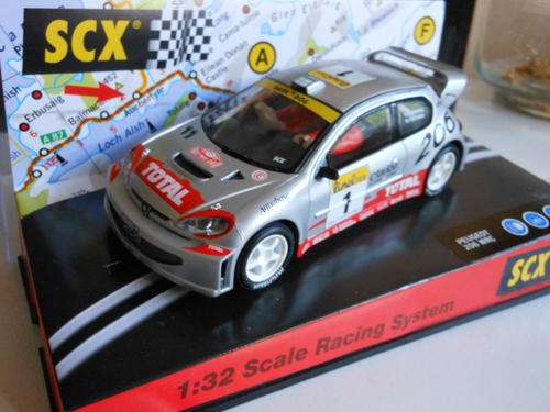 SCX ---PEUGEOT 206 WRC ----NEW
