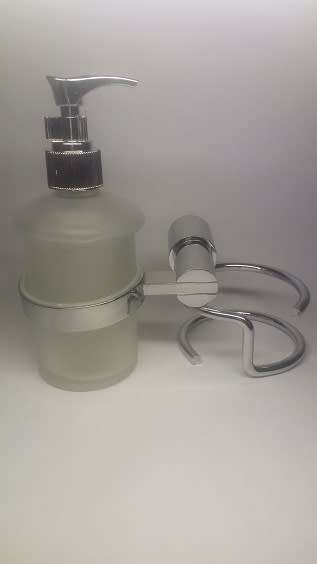 SOAP DISPENSER. BATHROOM WALL