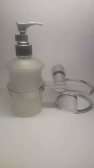 SOAP DISPENSER. BATHROOM WALL