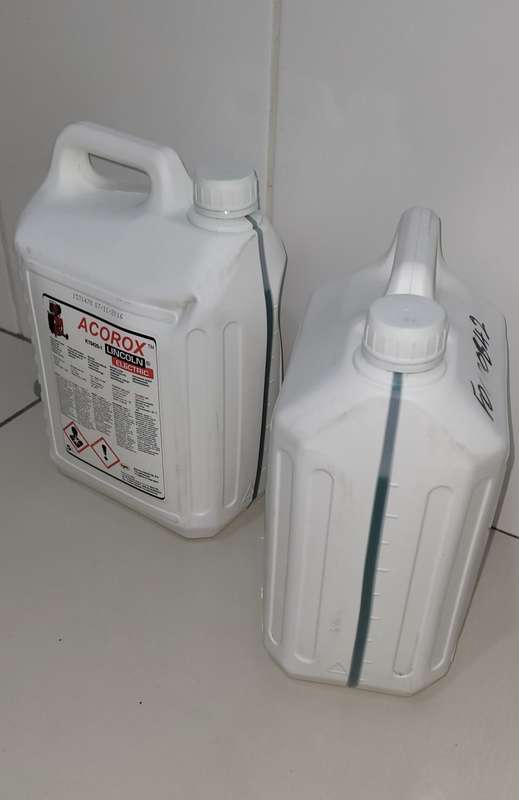 UNUSED LINCOLN ELECTRIC Coolant For Welder ACOROX. (Slow Leak Around The Cap) BID PER 5L Container