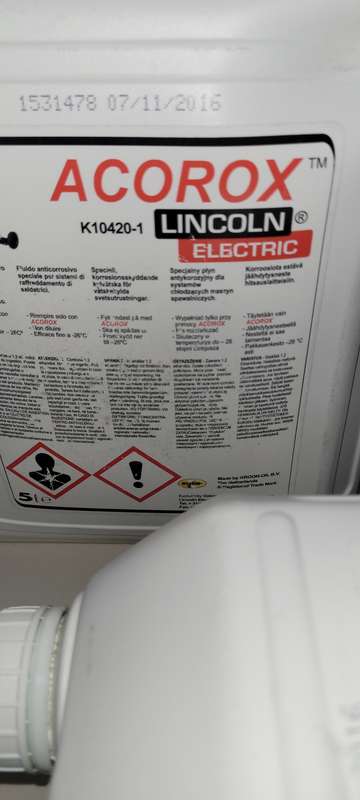 UNUSED LINCOLN ELECTRIC Coolant For Welder ACOROX. (Slow Leak Around The Cap) BID PER 5L Container