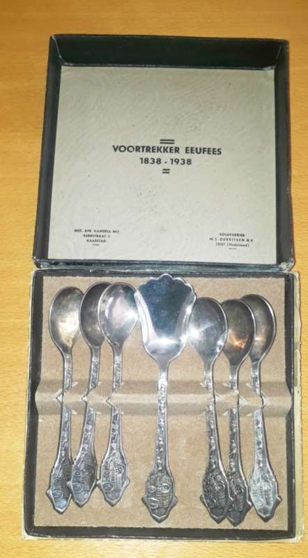 A Set of 6 Voortrekker Eeufees 1838 -1938 Teaspoons and one Sugar Spoon.
