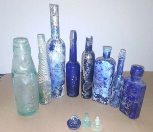 A Collection of 8 Vintage Bottles and 3 Stoppers (Various Conditions)