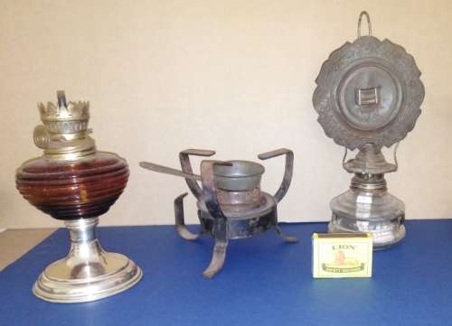 A Collection of Three Oil Lamps