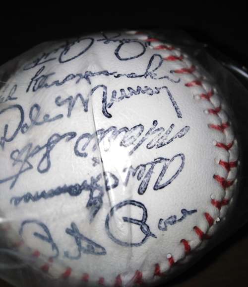 America American Baseball sealed in Plastic Bag with Cincinatti Reds Stamped? signatures