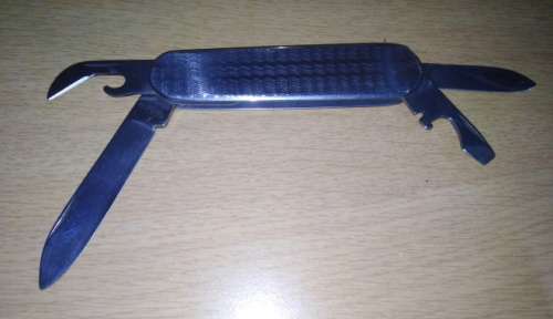 A Paper Knife and Mikov Pocket Knife with Fold Away Blades and Tools