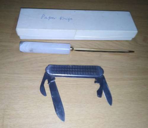 A Paper Knife and Mikov Pocket Knife with Fold Away Blades and Tools