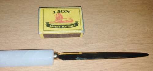 A Paper Knife and Mikov Pocket Knife with Fold Away Blades and Tools