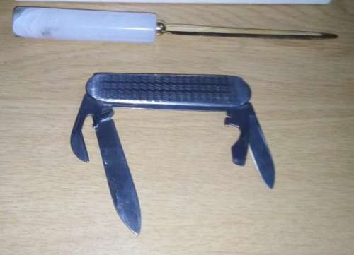 A Paper Knife and Mikov Pocket Knife with Fold Away Blades and Tools