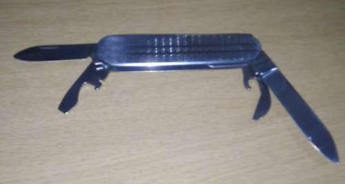 A Paper Knife and Mikov Pocket Knife with Fold Away Blades and Tools